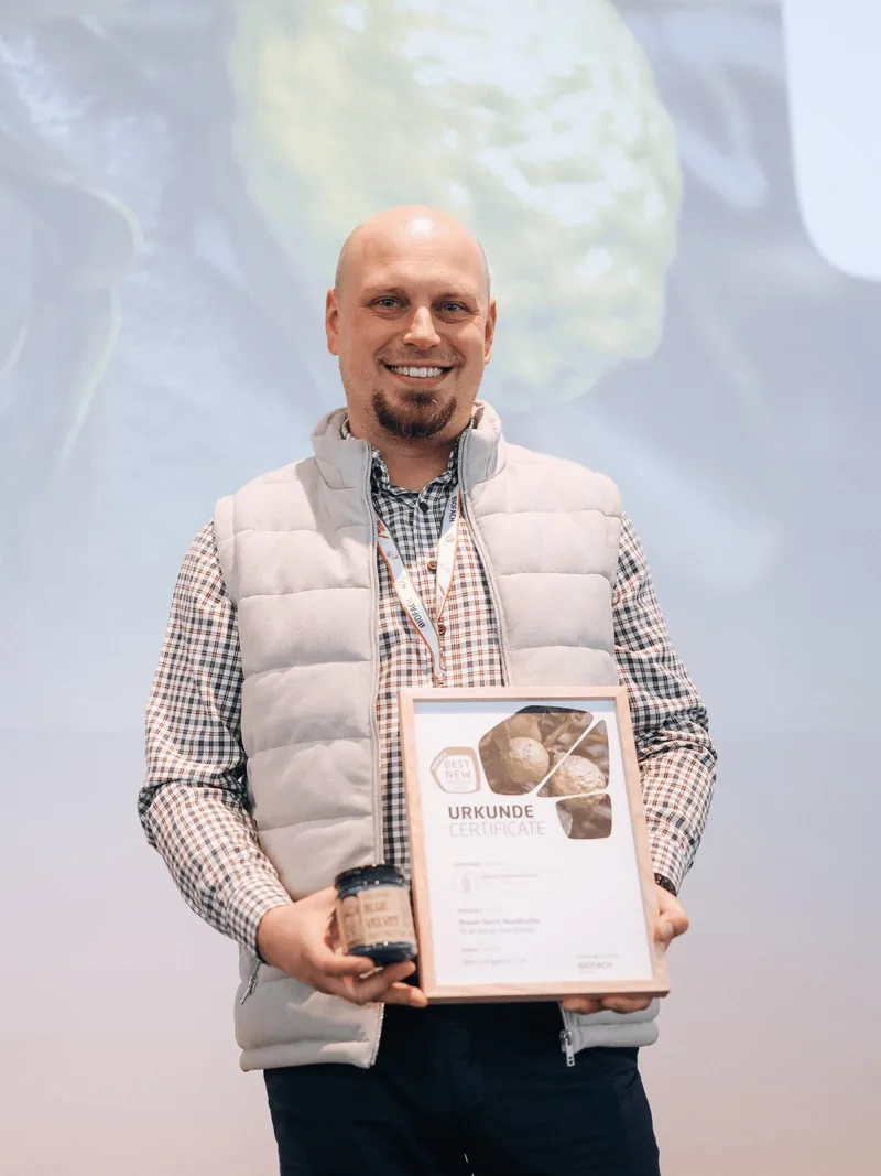 Receiving the BIOFACH Best New Product 2026 award on stage in Nuremberg